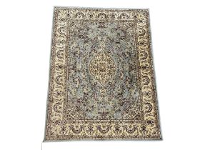 A Middle Eastern style rug. 117x161cm