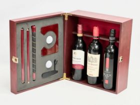 A Wine & Golf gift box. Containing Jacob’s Creek, Calvet Prestige, Black Lebel Red. 36x32x15cm