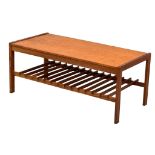 A Mid Century teak coffee table by Remploy. 101x51x43cm