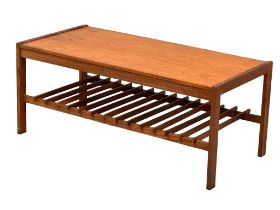 A Mid Century teak coffee table by Remploy. 101x51x43cm