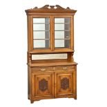 A large late Victorian walnut bookcase, circa 1890. 121x45.5x237cm