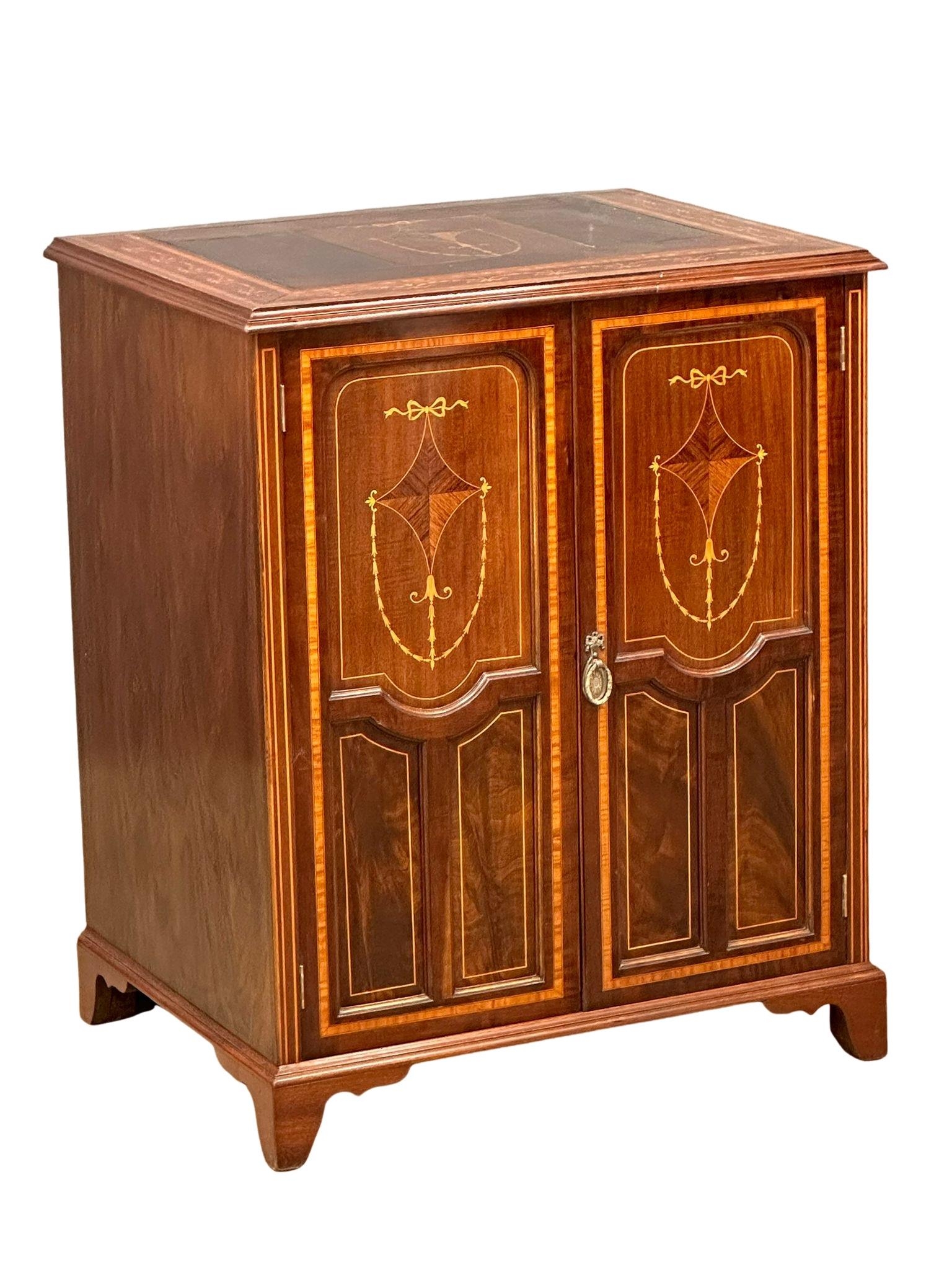A late 19th century Sheraton Revival inlaid mahogany linen cupboard/ side cabinet. Circa 1890-