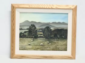 A large oil painting by Angie. Sheep’s in the Field. 49x39cm. Frame 66x56cm
