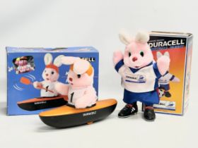 Duracell. A Duracell Kayaking Bunny with box and a Duracell Football Bunny with box. 35cm