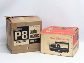 An Eumig P8 Automatic Novo projector and a Aldis 2000 Automatic projector.