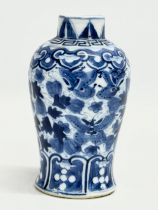 A late 19th century Chinese Emperor Guangxu (1875-1908) vase. Decorated with leaves, Greek Key and