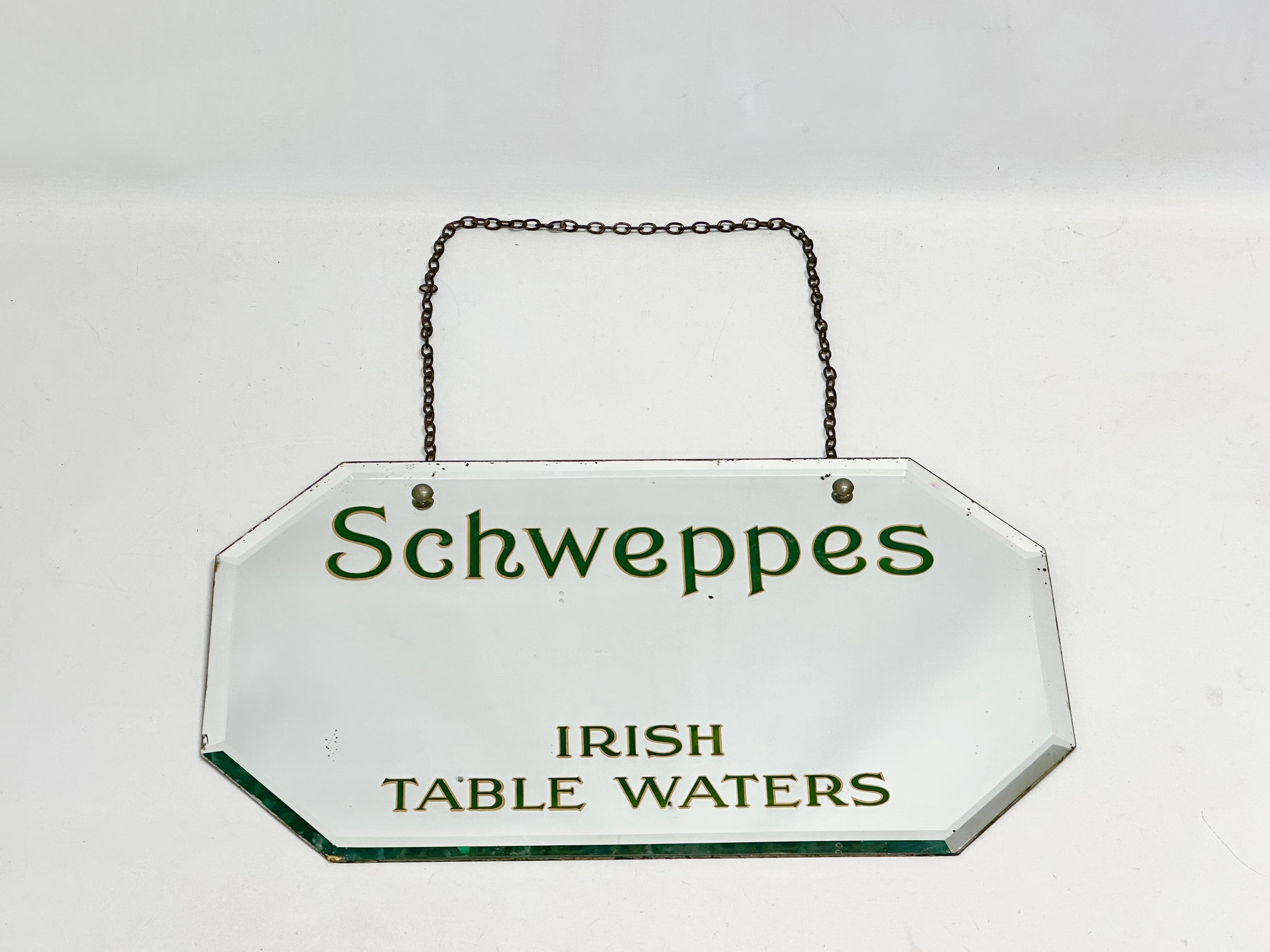 An early 20th century Schweppes Irish Table Waters advertising bevelled mirror. 51x31cm