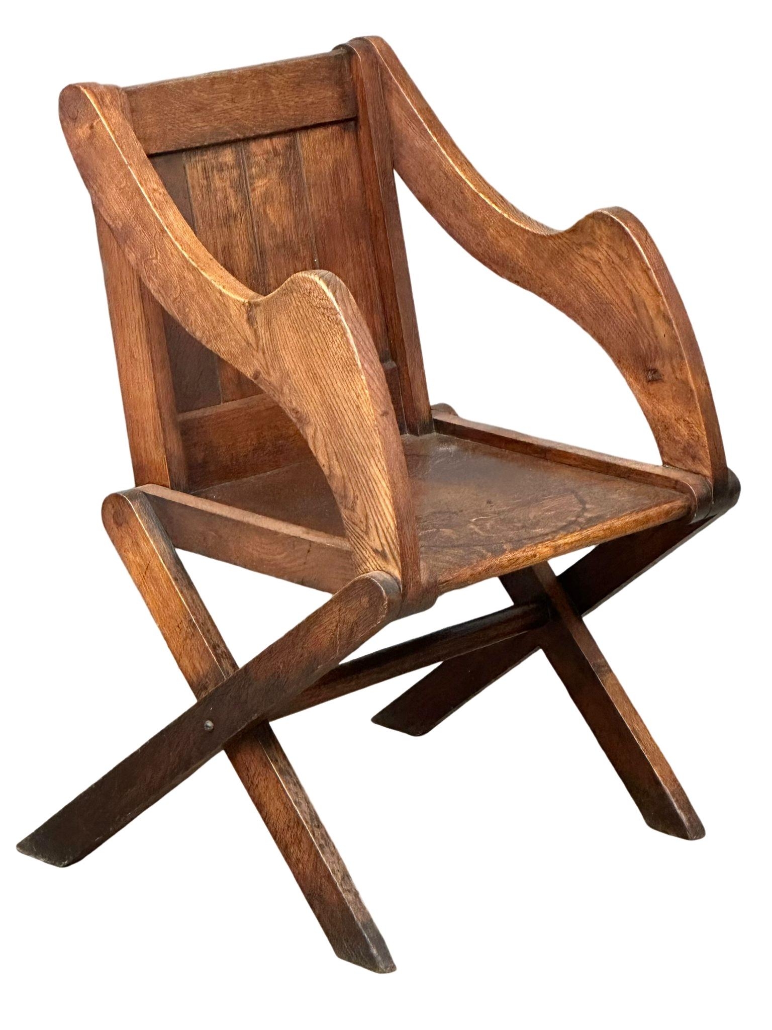 A late 19th century Glastonbury oak armchair. Circa 1890-1900. - Image 4 of 5