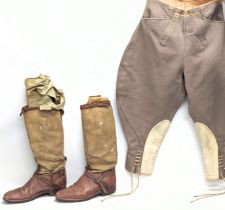 A pair of vintage horse riding / equestrian trousers and a pair of vintage horse riding boots.