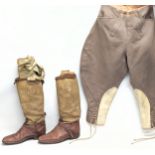 A pair of vintage horse riding / equestrian trousers and a pair of vintage horse riding boots.