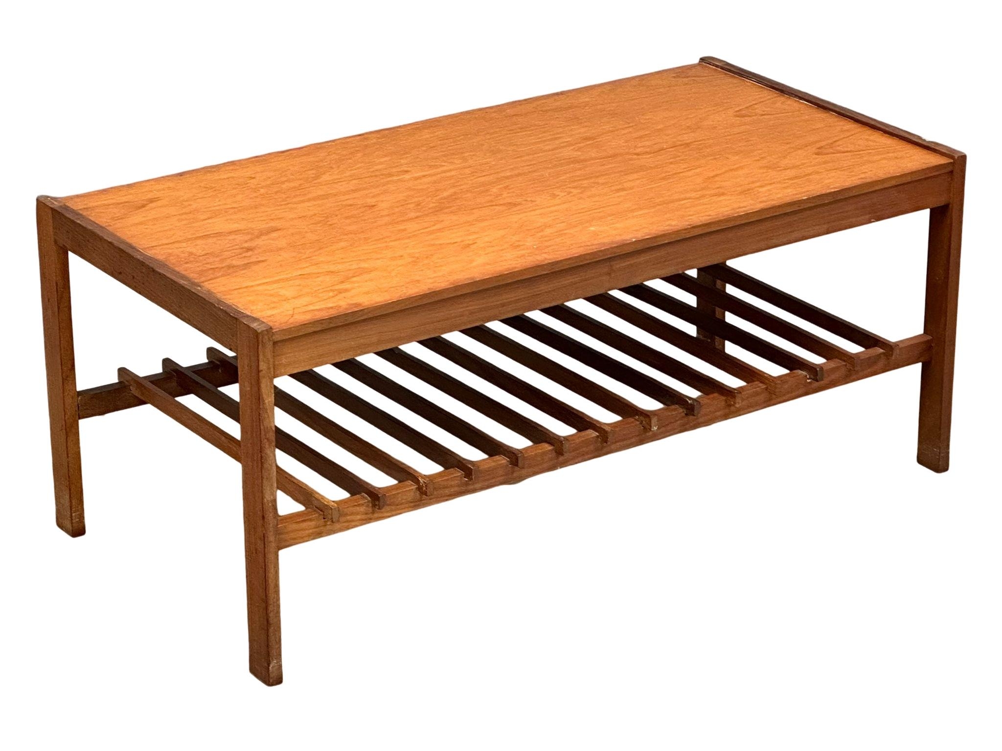 A Mid Century teak coffee table by Remploy. 101x51x43cm - Image 7 of 10