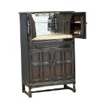 A vintage Priory style cocktail cabinet. 83x42x128