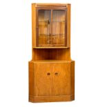 A Mid Century teak corner cabinet by Turnidge of London. 86x42x179.5cm(7)