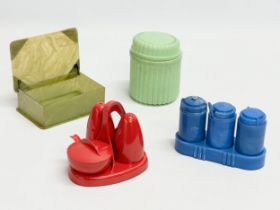 A collection of Bakelite. Melaware Melmex Melamine cruet set, A Bex Moulding cruet set. A Bakelite