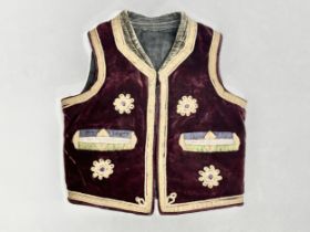 A vintage Middle Eastern embroidered vest.