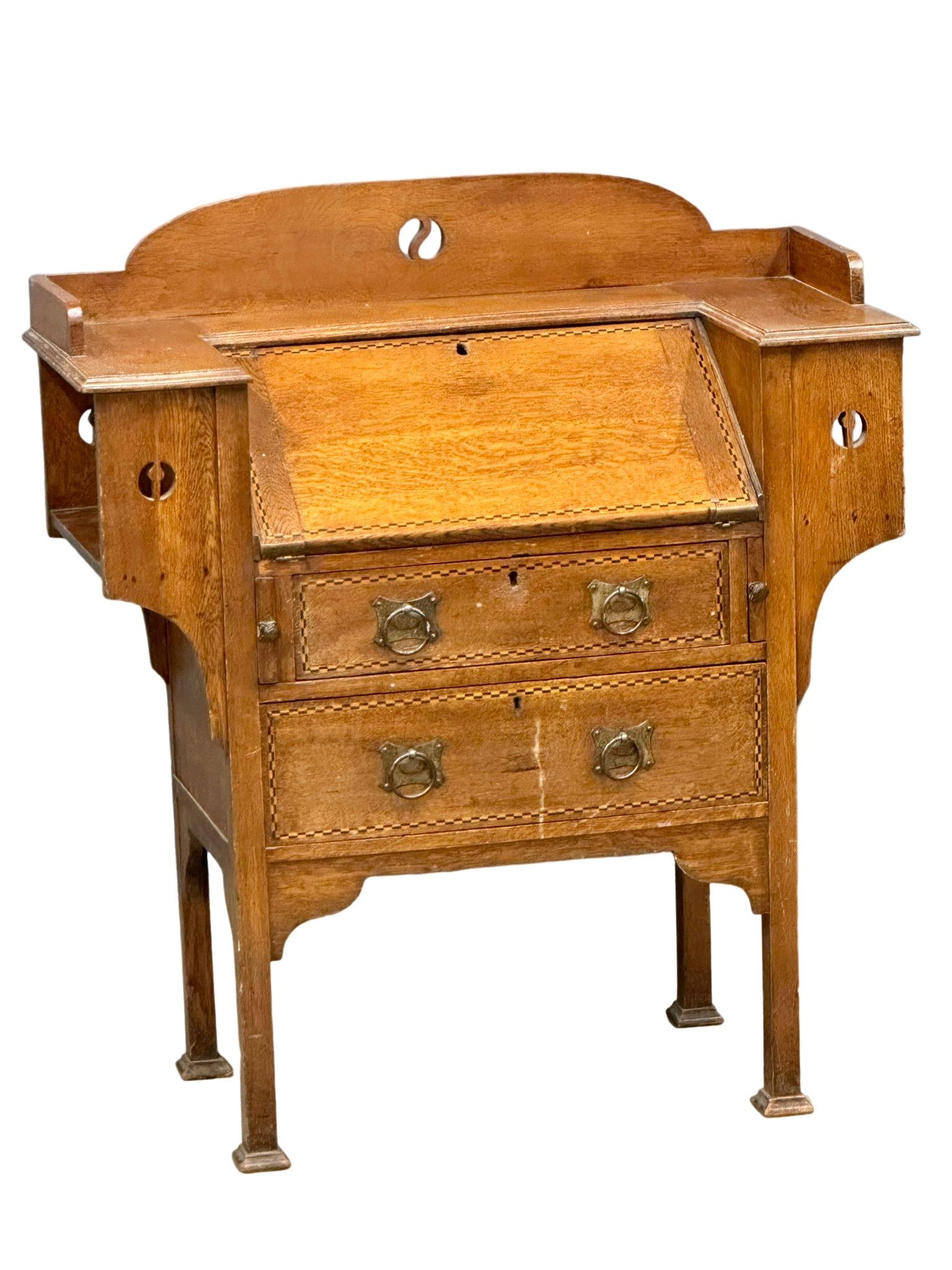 An early 20th century Art & Crafts inlaid oak writing bureau. Circa 1900. 99.5x41x111cm