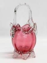 A Victorian Cranberry Glass basket. 23cm