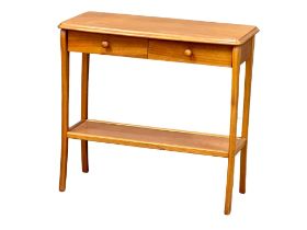 A Mid Century teak side table with 2 drawers by Sutcliffe. 83x36x78cm 1