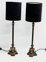 A pair of tall Burmese/French style table lamps. 71cm