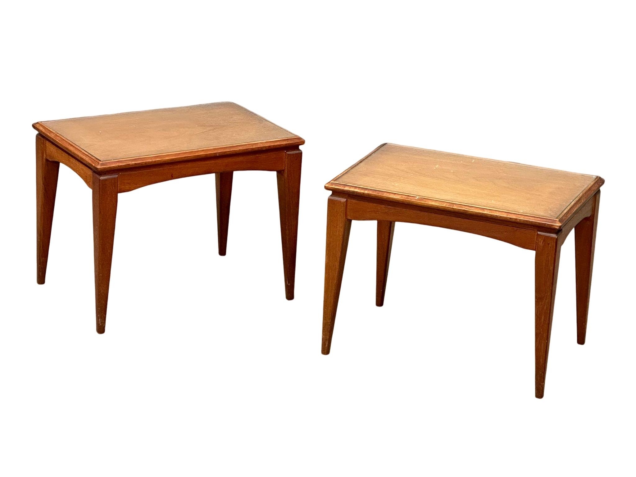 A pair of Mid Century teak lamp tables with glass tops, designed by Richard Hornby for Fyne Ladye