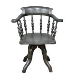 A late 19th/early 20th century painted swivel desk chair/smokers chair. Circa 1900.