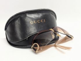 A pair of ladies Gucci Horsebit sunglasses in case