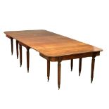A large George IV mahogany Economy table/dining table with some later alterations. Circa 1820. 307.