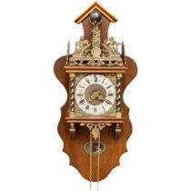 A Dutch Canal wall clock. With weights and pendulum. 62cm