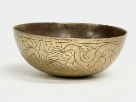 An early 20th century Chinese brass bowl. 16x6.5cm