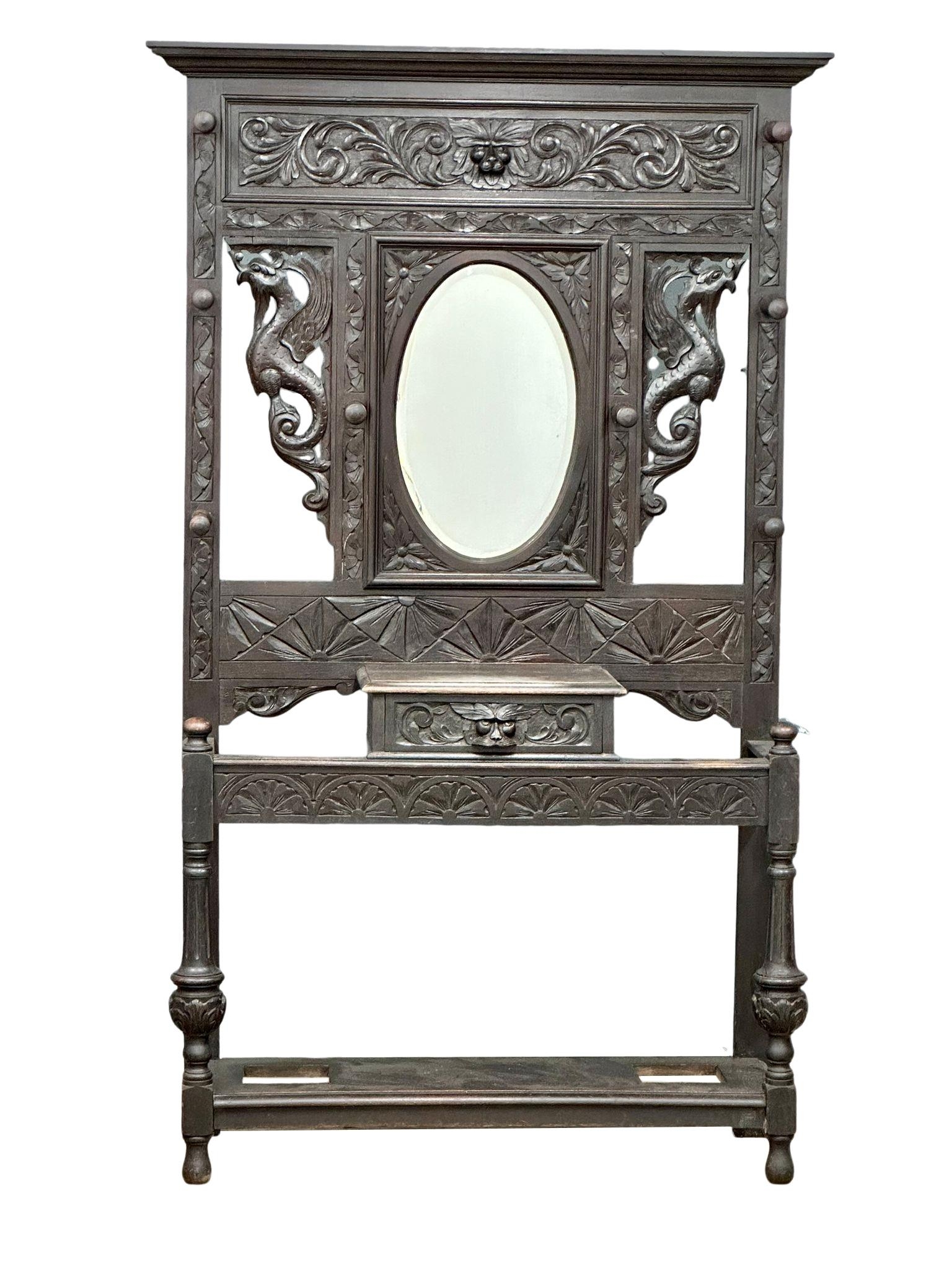 A large 19th century carved oak hallstand. Circa 1860-1880. 120x36x195cm