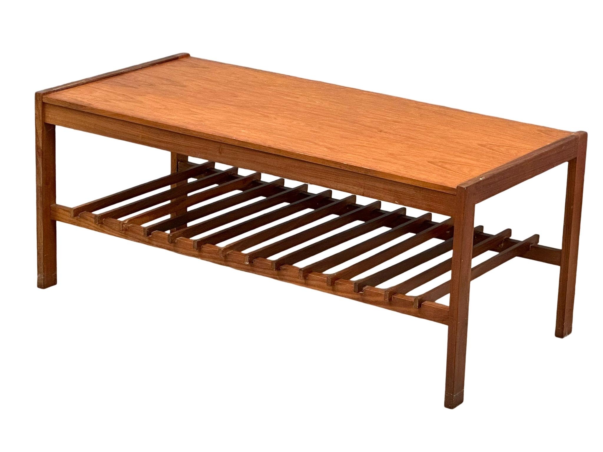 A Mid Century teak coffee table by Remploy. 101x51x43cm - Image 2 of 10