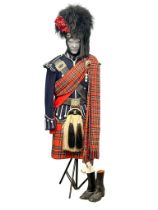 A vintage Scottish Highlanders pipe band uniform on mannequin, 186cm