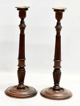 A pair of large excellent quality late 19th century George III style mahogany candlesticks. Circa