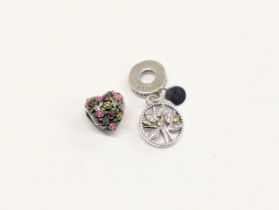2 silver charms. Total weight 4.45g