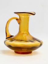 An early 19th century Amber Glass jug. Circa 1800-1830. 17x16x16cm