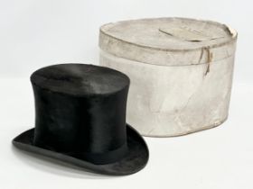 An R.W. Woolley LTD top hat with box. Best Quality London.