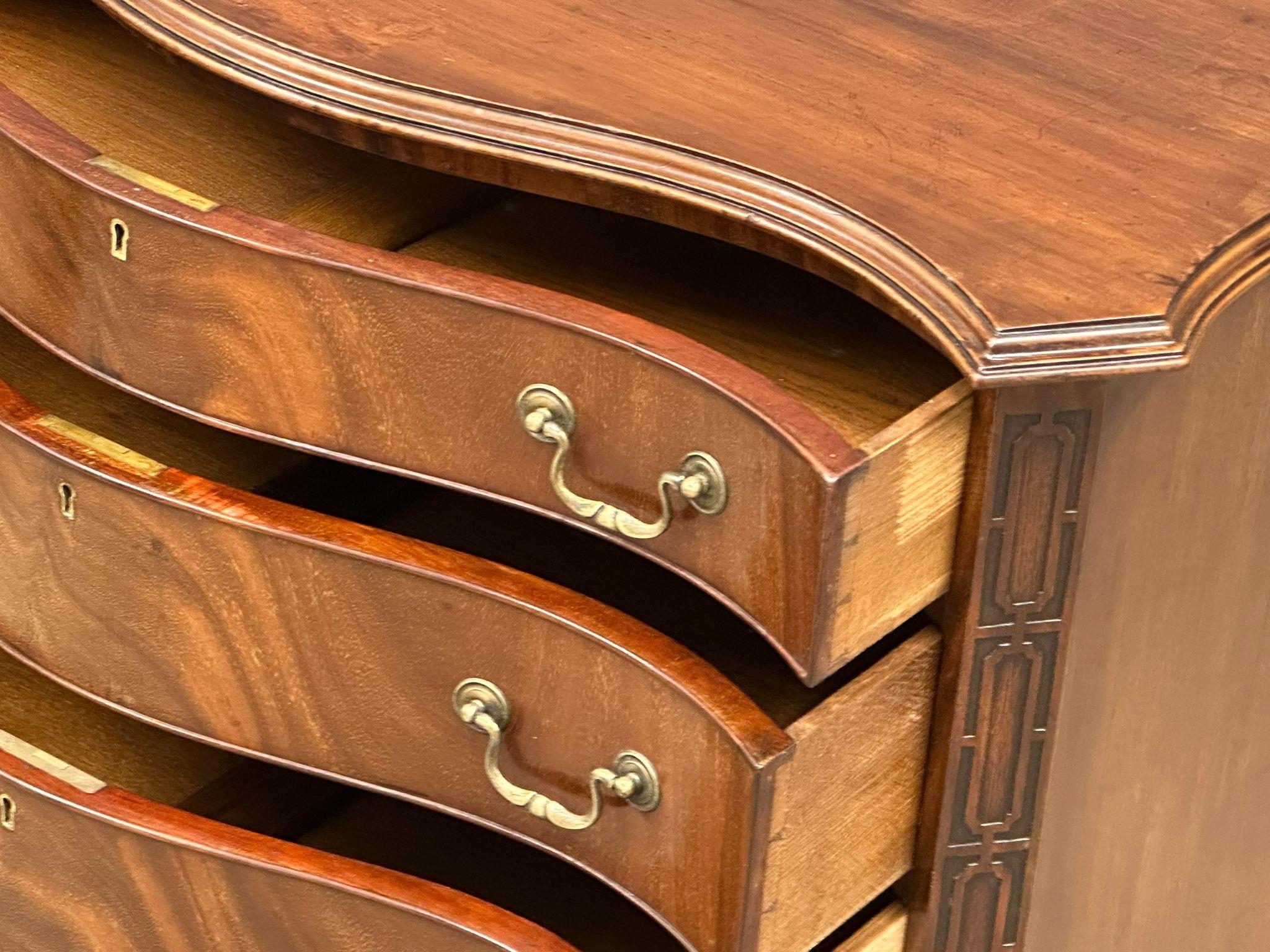 A good quality late 19th century Chippendale Revival mahogany serpentine front chest of drawers. - Image 4 of 22