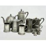 A collection of mid 19th century pewter ware. 2 large Victorian pewter tankards 17x18cm. Pewter