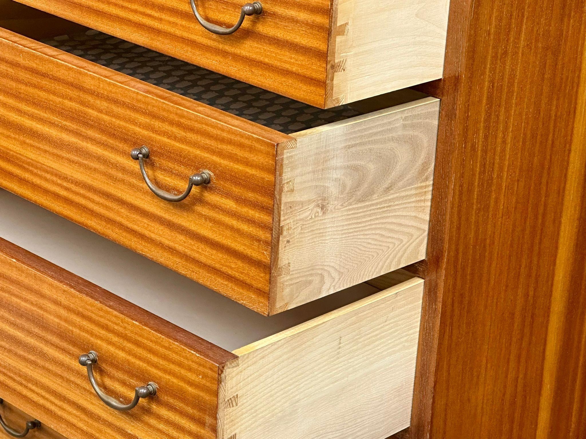 A large Danish Mid Century tola wood tallboy chest of drawers. 75.5x43.5x132.5cm(4) - Image 2 of 8