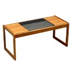 A Mid Century teak coffee table with smoked glass top by Myer. 96x43x43cm