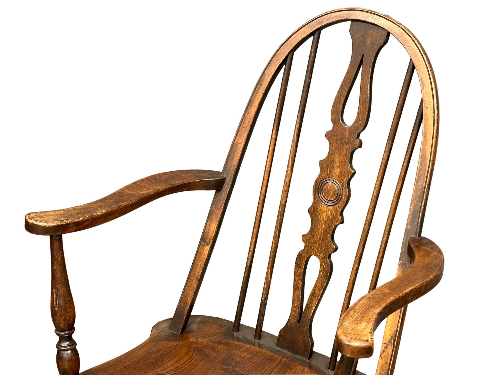 A pair of early 20th Century elm and beech Windsor style armchairs - Image 6 of 6