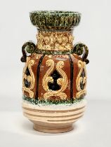 A large Italian Majolica glazed pot. 18x31.5cm