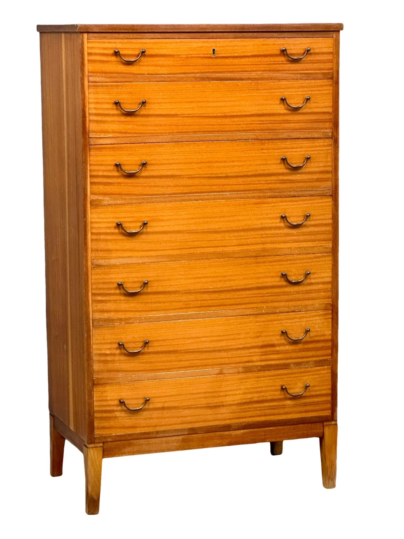 A large Danish Mid Century tola wood tallboy chest of drawers. 75.5x43.5x132.5cm(4) - Image 7 of 8