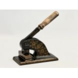 A Mid Victorian cast iron stamp press/paper embosser. 17x19cm