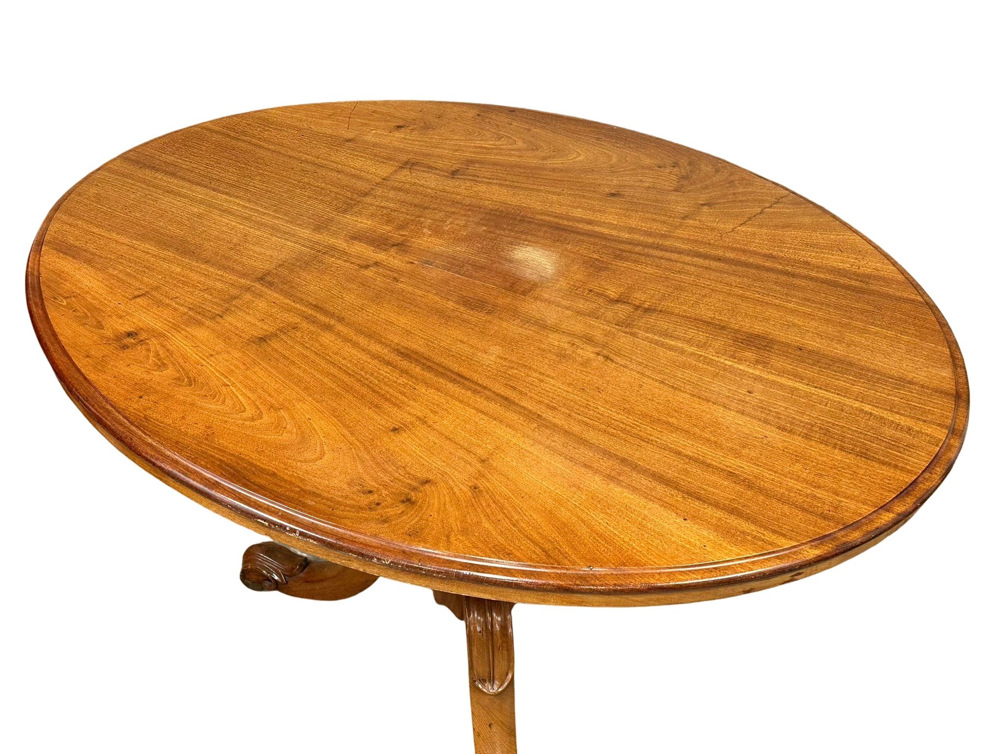 A Victorian mahogany tilt top breakfast table. 112x88x74cm(2) - Image 5 of 5