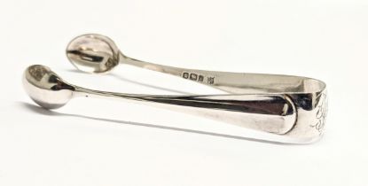 A pair of late 19th century silver sugar tongs by James Deakin & Sons. Sheffield, 1898. 13.27g