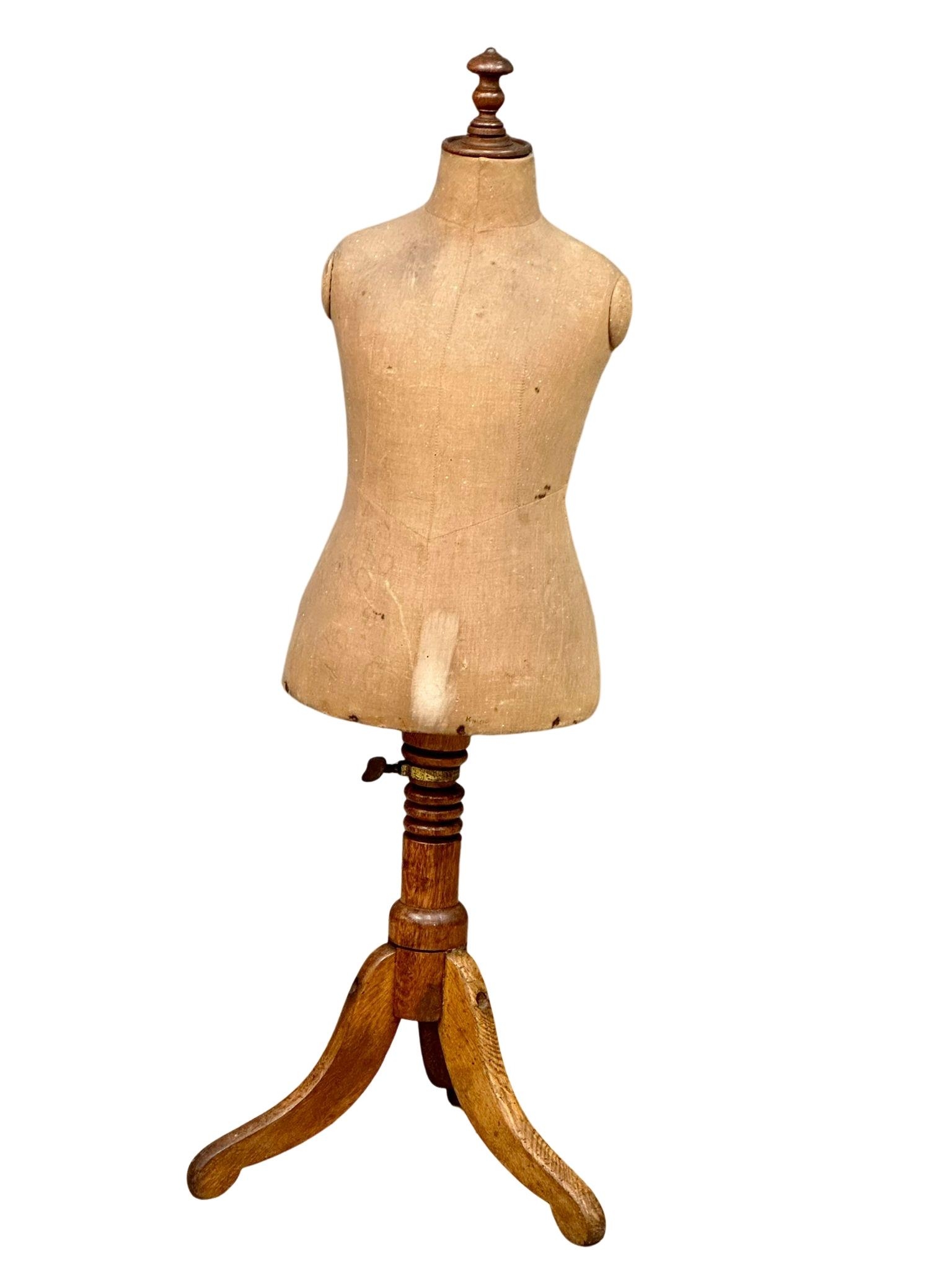 An early 20th Century child's telescopic shop mannequin, max height 124cm