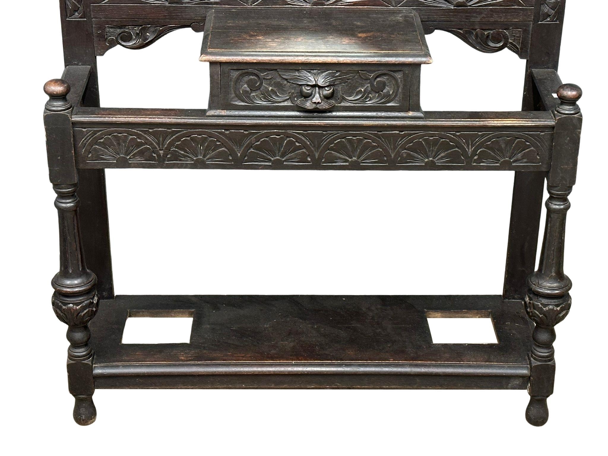 A large 19th century carved oak hallstand. Circa 1860-1880. 120x36x195cm - Image 4 of 5