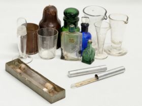 A collection of late 19th century Apothecary/Chemist measures, medicine glass with leather case etc