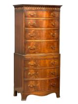 An early 20th Century George III style mahogany bow front tallboy chest on chest with brushing